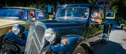 The guests enjoy their classic car